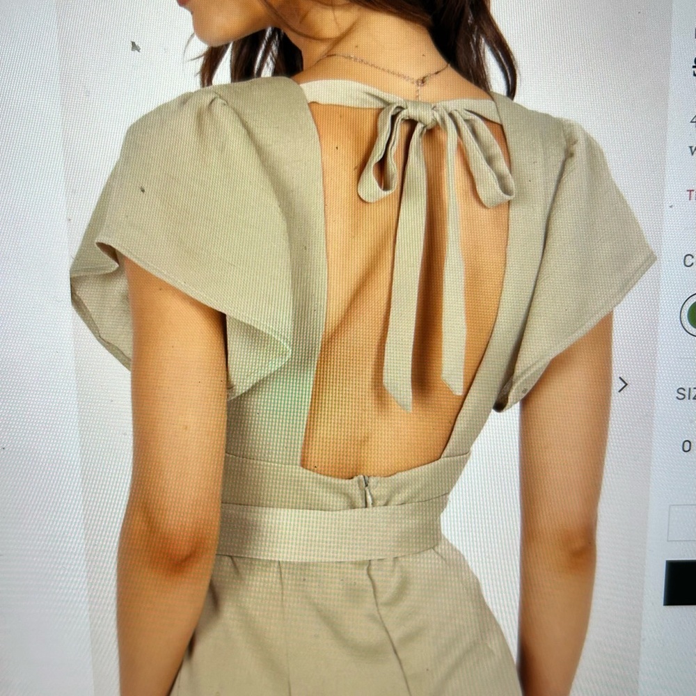 Jumpsuit from Petal and Pup in the color Olive. Brand new with tags on